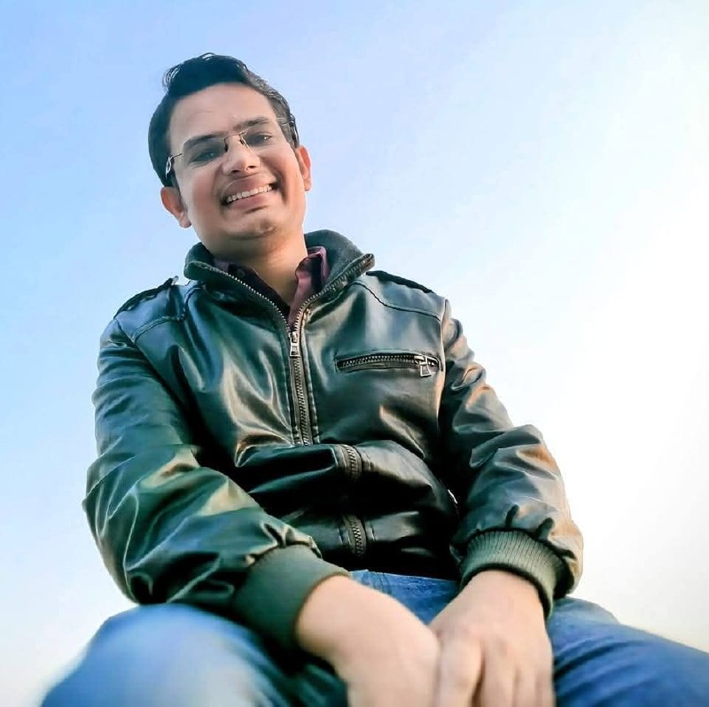 Shakti Tiwari — outdoor portrait, green jacket