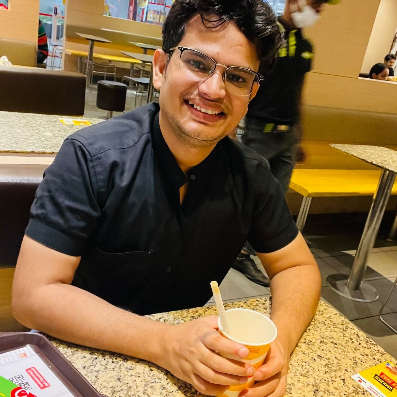 Shakti Tiwari — at a restaurant, casual